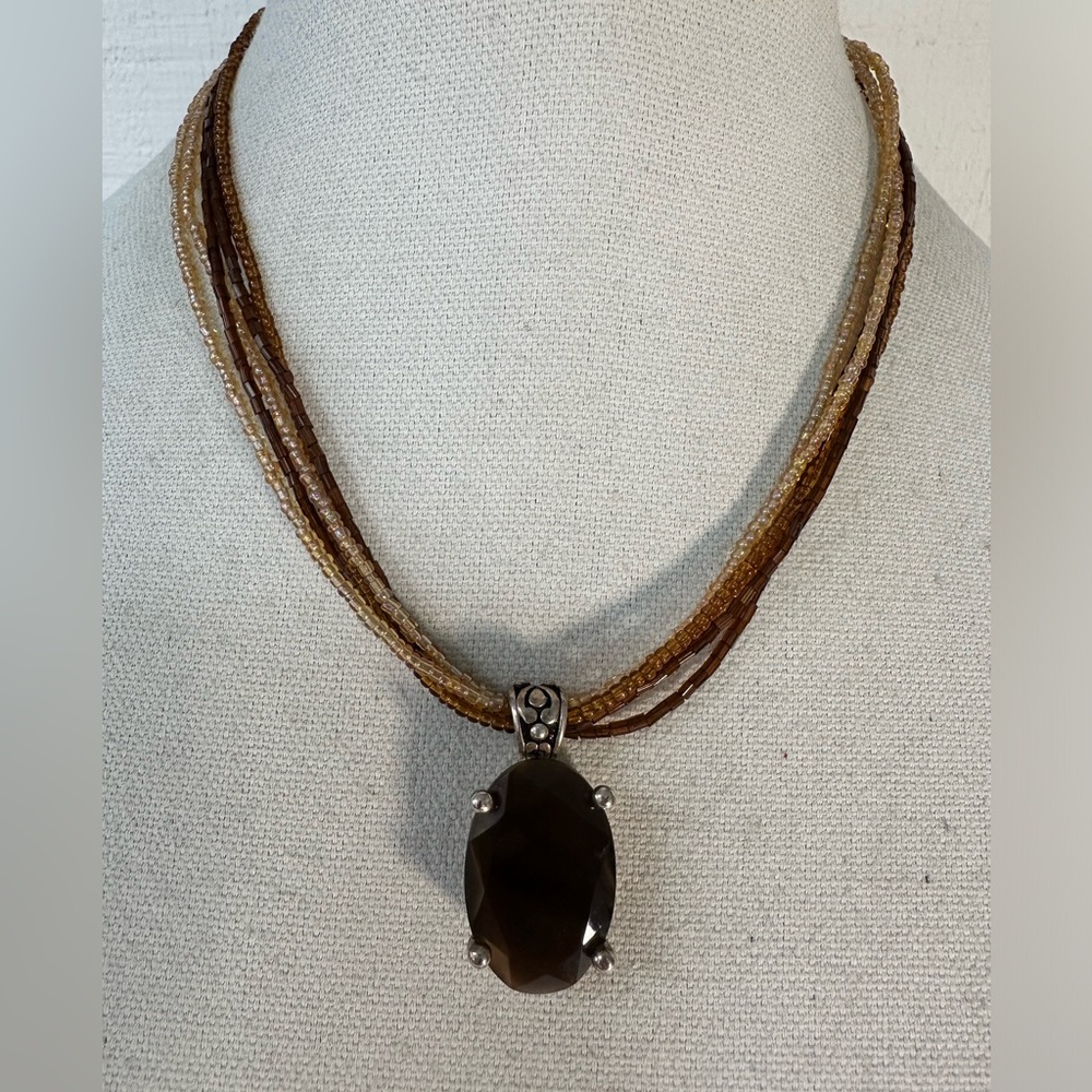 Neutral brown tone seed bead necklace with topaz style pendant